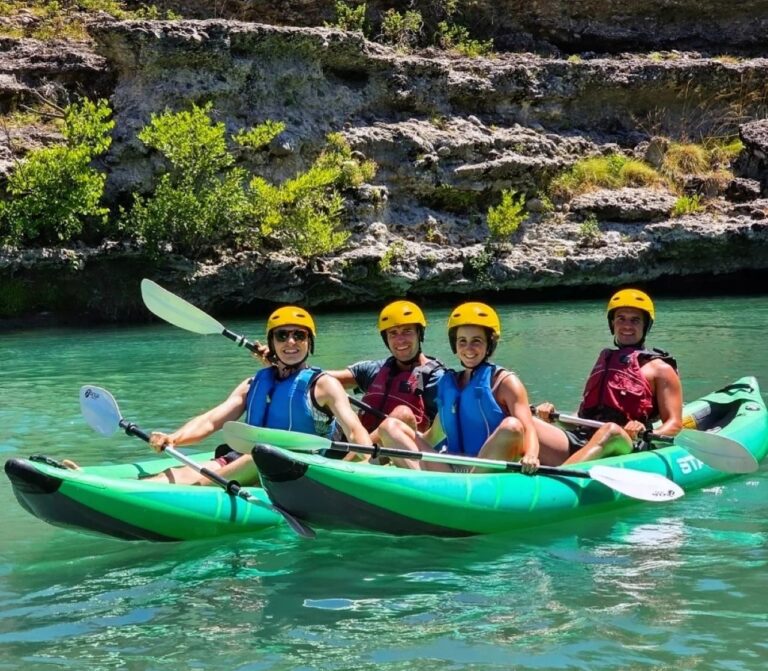 Kayakers paddling together on the wild Vjosa River in Albania