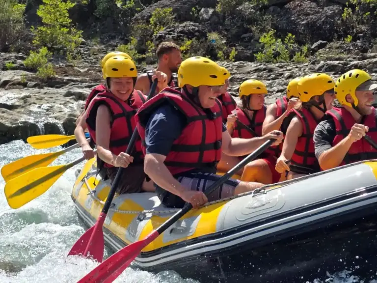 paddling through fast water rafting in Permet