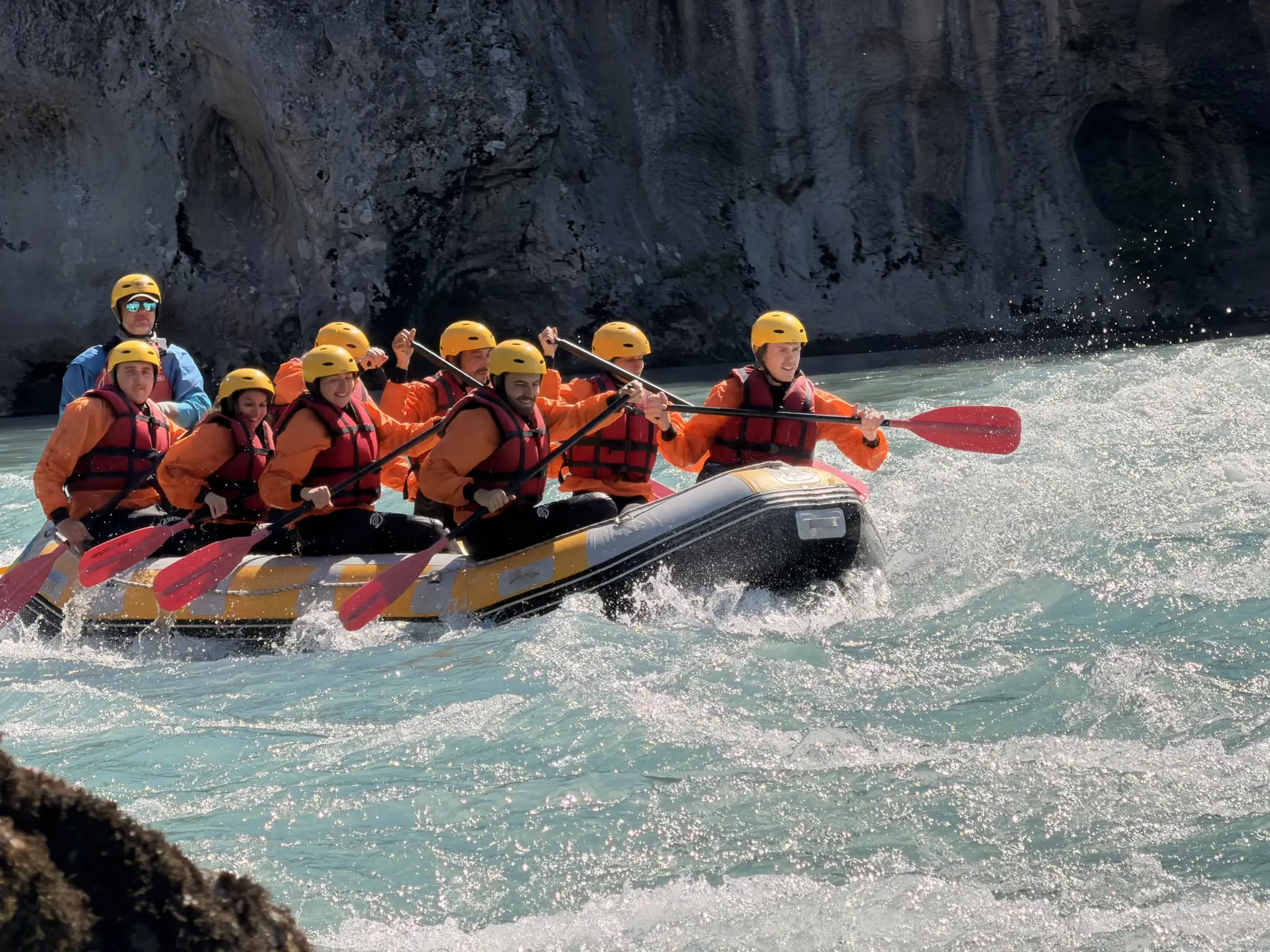 Rafters bracing through white water in the Vjosa gorge near Përmet