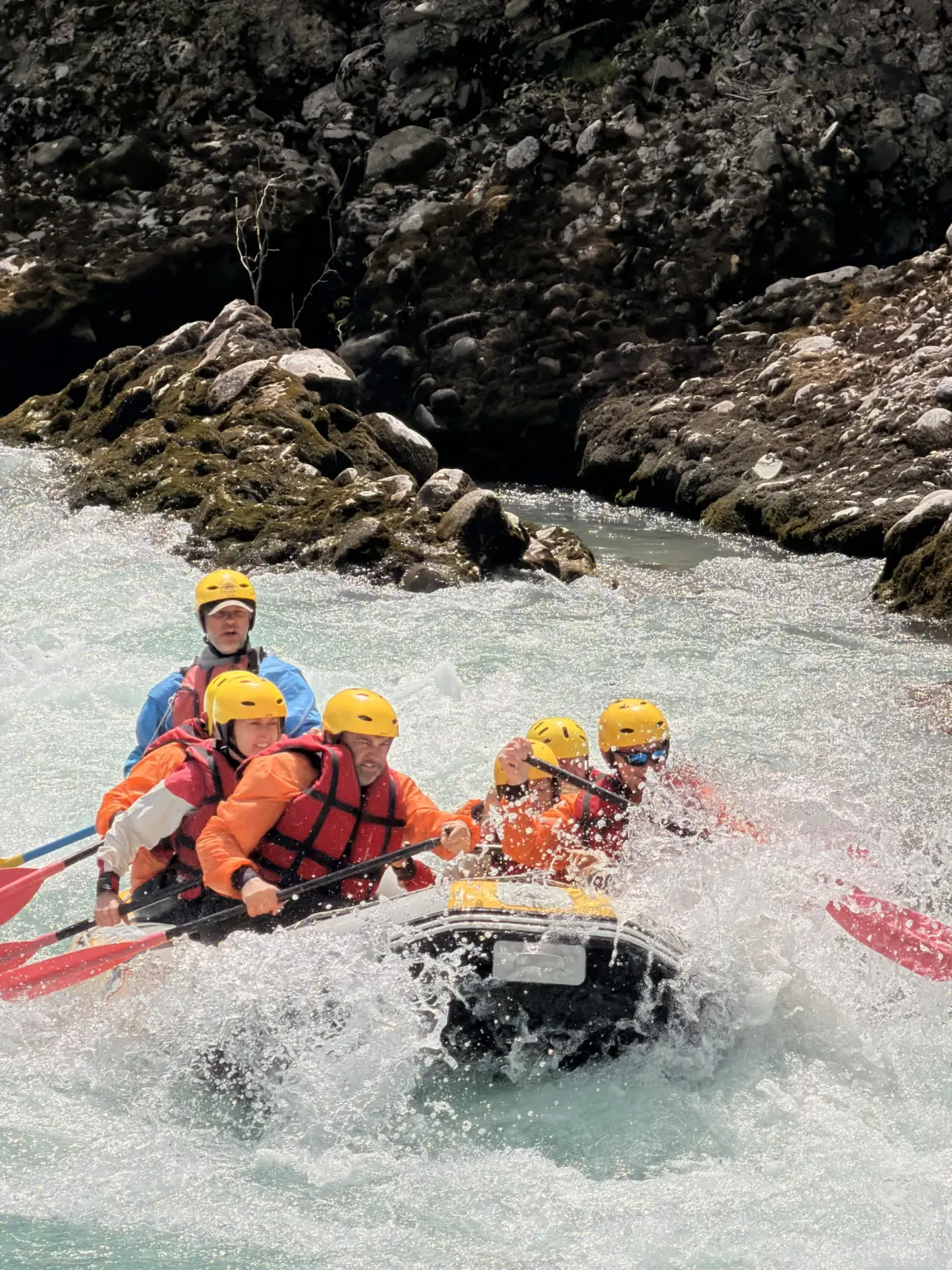 Raft entering a Class III rapid on the Vjosa River near Përmet