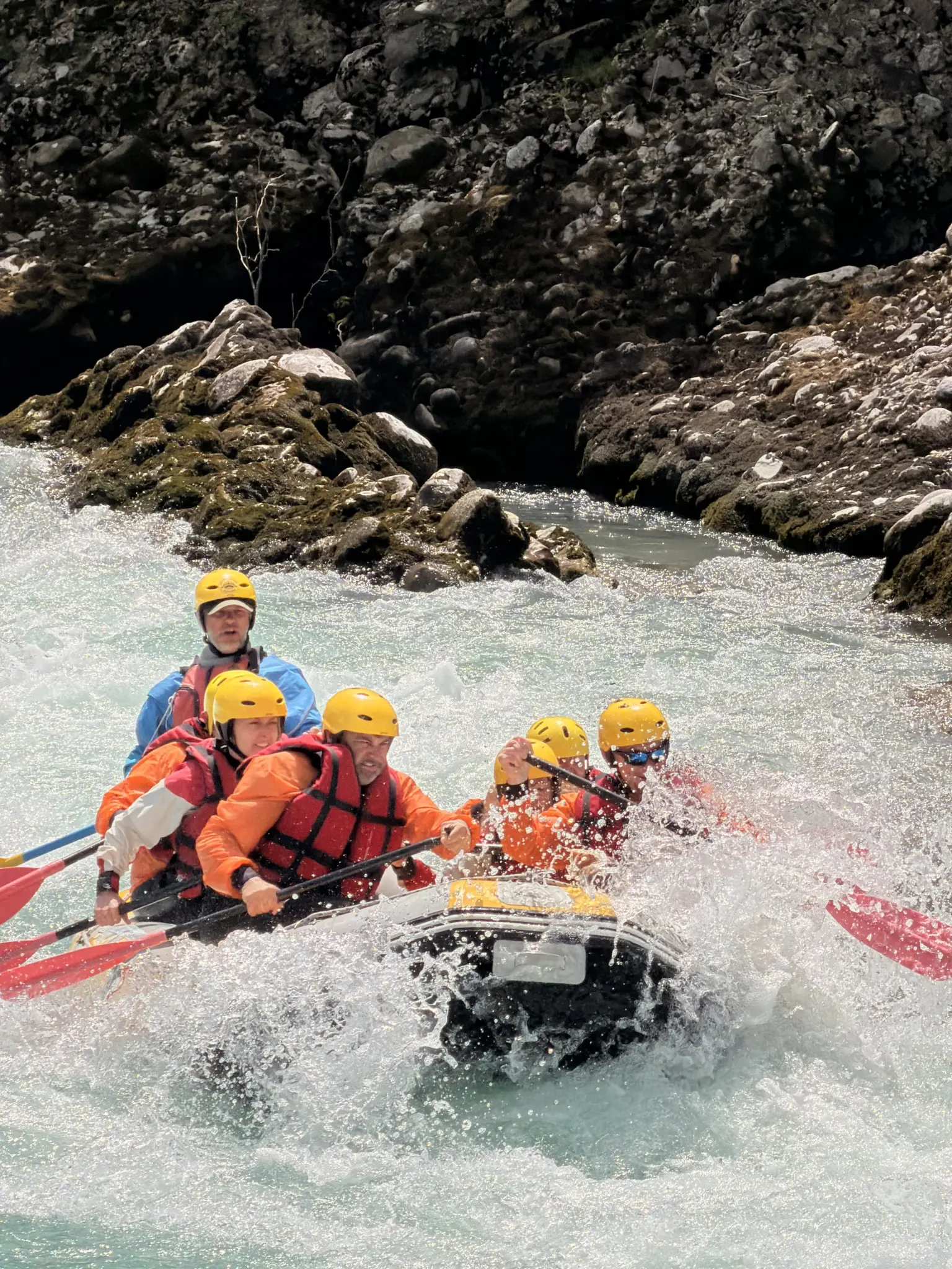 Raft entering a Class III rapid on the Vjosa River near Përmet