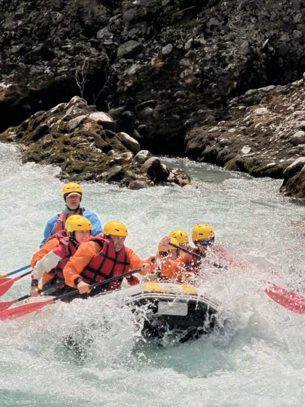 Raft entering a Class III rapid on the Vjosa River near Përmet